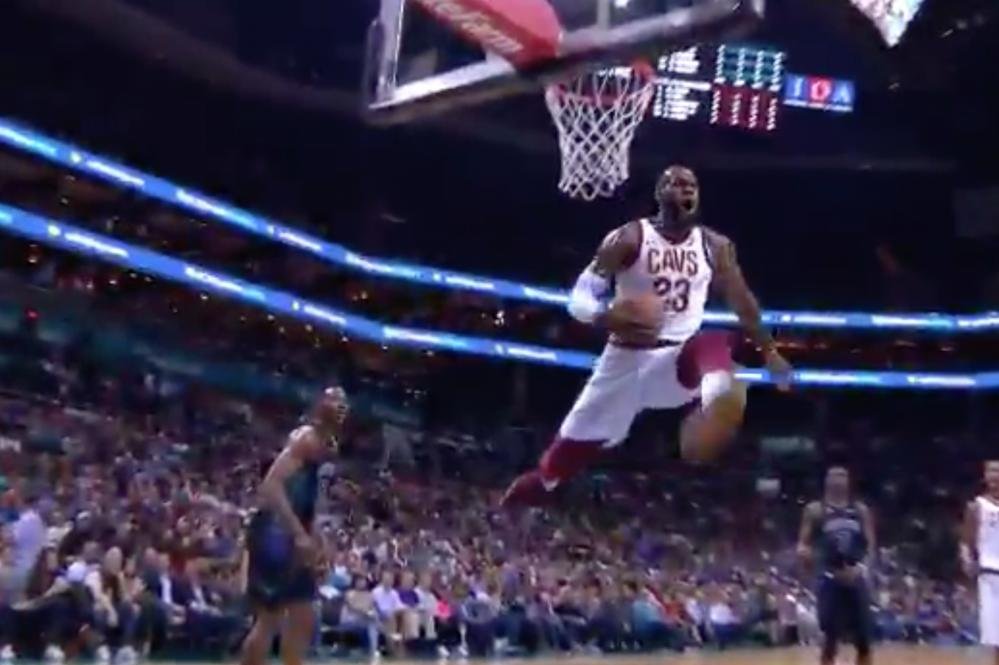 LeBron James soaring through the air for a powerful dunk