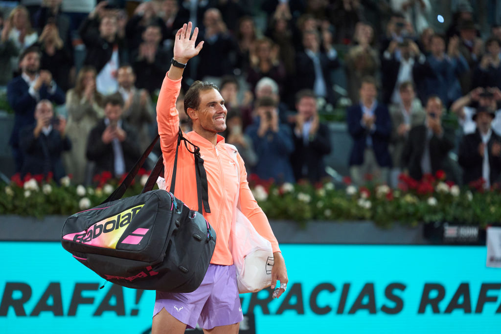 Rafael Nadal waves 
to the crowd, marking his farewell from tennis.