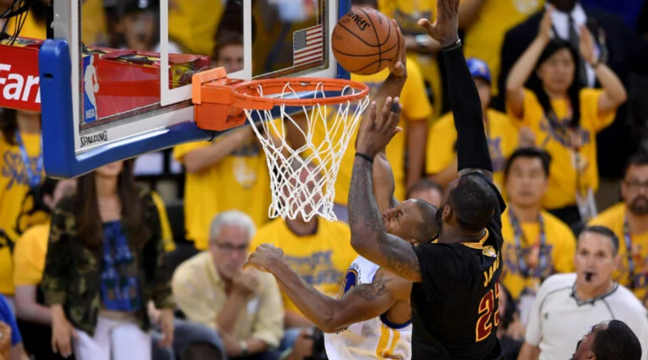 LeBron James makes a legendary chase-down block in Game 7 of the 2016 NBA Finals against the Golden State Warriors, securing a crucial moment in Cleveland Cavaliers history.